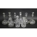 A Collection of Various Cut Glass Decanters