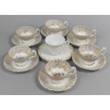 An Aynsley Tea Set Decorated with Central Garland of Flowers and with 22KT Trim and Floral Border