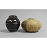 A Black Glazed Lidded Ginger Jar Together with a Hand Thrown Stoneware Pot