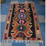 A Handmade Patterned Rug, 160x93cm