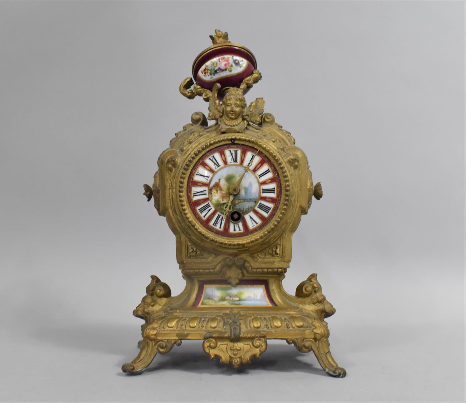 A French Gilt Plated Spelter Mantel Clock with Porcelain Panels and Vase Finial, Substantial