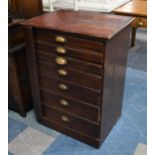 A Late 19th Century Wellington Style Chest with Seven Graduated Drawers and Hinged Locking Plate,
