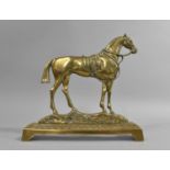 A WWI Period Brass Door Stop in the Form of a War Horse, 23cms Wide