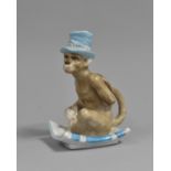 A Porcelain Ceramic Novelty Bedchamber Stick in the Form of Monkey Sat on Cushion, 16cm high