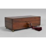 A Small Mid 19th Century Walnut Rectangular Box with Polished Brass Feet Complete with Key, 15cms