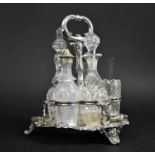 An Early 20th Century Silver Plated and Glass Six Bottle Cruet on Three Scrolled Feet, 23cms High