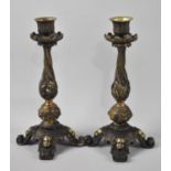 A Pair of French Bronze Candlesticks, Each with Four Scrolled feet and Mask Decoration, 23cms High