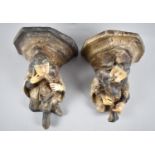 A Pair of Continental Cast Plaster Gargoyle Style Wall Sconces depicting Musicians, 18cms High