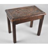 A Late 19th/Early 20th Century Carved Oak Rectangular Stool, 36x23x30cms High