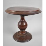A 19th Century Mahogany Miniature Circular Snap Top Table on Vase Support, Perhaps and Apprentice