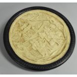 A Composition Circular Wall Hanging Charger in the Manner of Bretby Decorated with Oriental