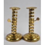 A Pair of British Brass Spiralled Candlesticks with Screw Operated Candle Adjuster, 21cms High