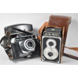 A Vintage Leather Cased Halina Prefect Camera together with a Halina 35xMKII Camera