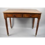 A Late 19th Century Two Drawer Side Table with Turned Supports, 96cms Wide