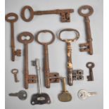 A Collection of Vintage Cast Iron Door Keys together with Later Examples