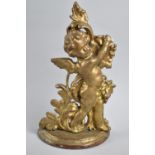 An Enamelled and Gilt Decorated Cast Iron Fire Tidy in the Form of Cherub with Bunch of Grapes, No