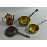 A Small French Copper Frying Pan, Two Small Brass Saucepans and a Copper Coffee Pot