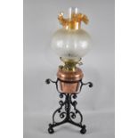 A Copper and Brass Oil Lamp Set in Wrought  Iron Tripod Stand and with Later Etched Glass Shade with