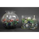 A Collection of Various Marbles and Coloured Glass Stones, Both Housed in Clear Glass Vases