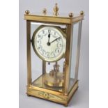 An Early 20th Century Gilt Brass Cased Four Glass Clock with Torsion Movement, White Enamelled