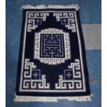 A Small Patterned Hearth Rug, 62x94cm