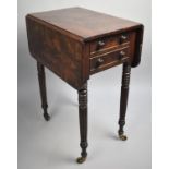 A Small 19th century Crossbanded Mahogany Two Drawer Ladies Drop Leaf Work Table on Turned Reeded