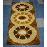 A 1970's Reichel Patterned Woollen Rug, 140x67cm