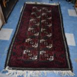 A Patterned Woollen Rug, 157x79cm