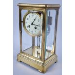 A Late 19th/Eary20th century Brass Cased Four Glass Mantel Clock with Mercury Weighted Pendulum,