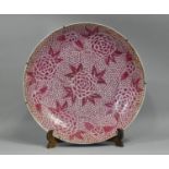 A Large 19th Century Porcealin Charger Decorated with Floral Design in Puce Enamel, Restoration to