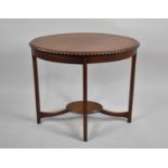 A Cut Down Edwardian Oval Topped Occasional Table, 62cm wide