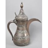 A North African White Metal Coffee Pot with Engraved Banded Decoration to Body, 27.5cms High
