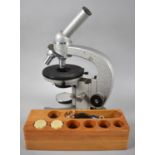 A Vintage Russian Monocular Microscope with Spare Lenses etc