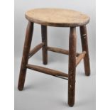 A Late 19th/Early 20th Century Oval Topped Stool on Turned Supports with Stretchers, 42cms High