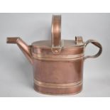 A Late 19th Century Copper Water Can with Hinged Lid, 26cms High