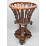 A reproduction Mahogany Victorian Style Planter with Trefoil base and Dolphin Supports, 50cms