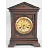 An Edwardian Architectural Mantel Clock, Made in Wurttemberg but Retailed by H Samuel, Manchester,