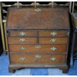A George III Crossbanded Oak Fall Front Bureau with Fitted Interior and Well, Secret Compartments,