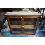 A Wall Mounting Stained Pine Glazed Shelved Cabinet, 95cm wide