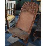 A Large Vintage Carved African Two Part Chair, 120cm high