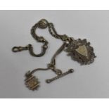 An Edwardian Royal Welsh Fusiliers Gold and Silver Fob Dated 1910 together with Two Watch Chains