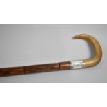 A Vintage Horn Handled Faux Bamboo Walking Stick with Silver Collar