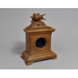 A Carved Wooden Black Forest Pocket Watch Holder with Sporting Bird Finial, 17cms High