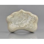 A Chinese Pottery Pillow of Cloud Form with Incised Fish in Pond Design, White Glaze, 28x11.5cms