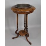 A 19th Century Walnut Jardiniere Table with a Circular Burr Walnut Top over Three Shaped Legs, 45cms