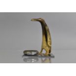 An Early 20th Century Art Deco Smoker's Companion, A Carved Horn Penguin with Glass Eyes Mounted