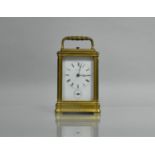 A Late 19th/Early 20th Century French Quarter Repeater Carriage Clock with White Enamel Dial for