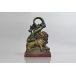 A Cast Iron Allegorical Door Stop, Lion and Serpent, Polychrome Painted Enamels, 29cms High