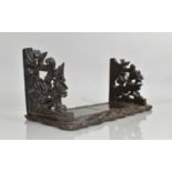 A 19th Century Black Forest Carved Linden Wood Book Slide, 43x20x20cms High