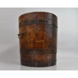 A Coopered Oak Peat Bucket with Brass Bands and Twin Drop Handles, 38cms high